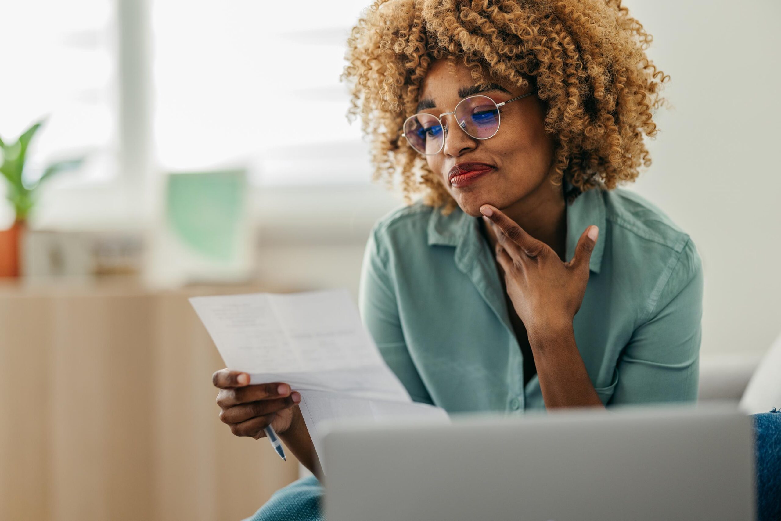 woman reviewing electricity bill