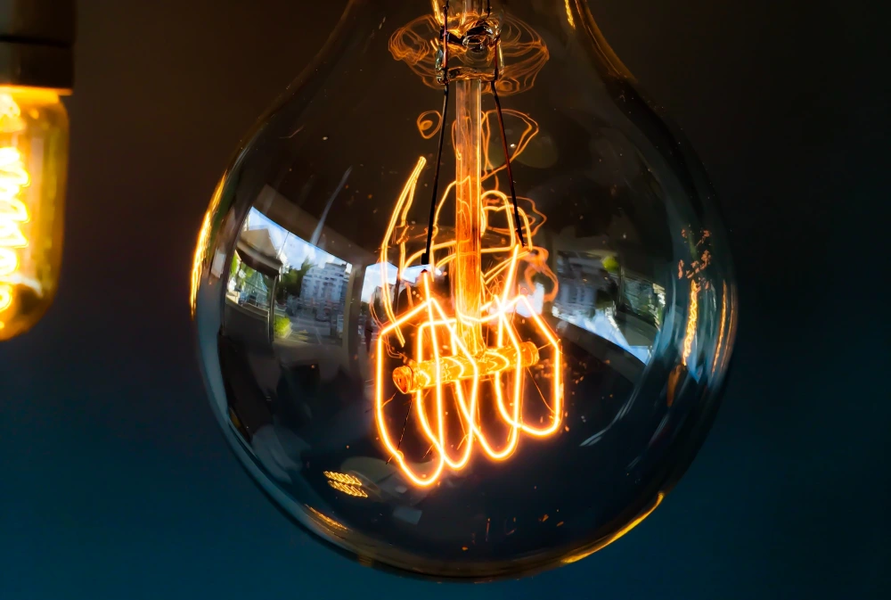 lightbulb coils burning with electricity