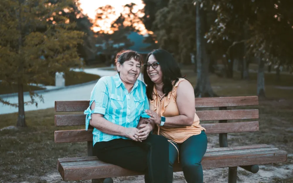 woman sitting on park bench